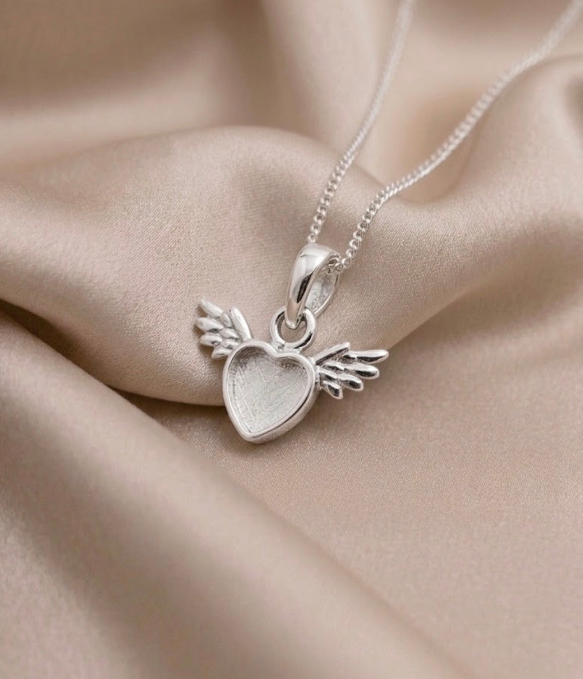 Tiny Winged Heart Pendant